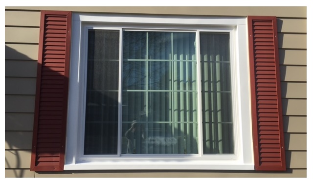 three lite slider window with double prairie grids