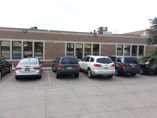 Commercial painted windows, picture and awning, bronze tint, Bedford Ohio