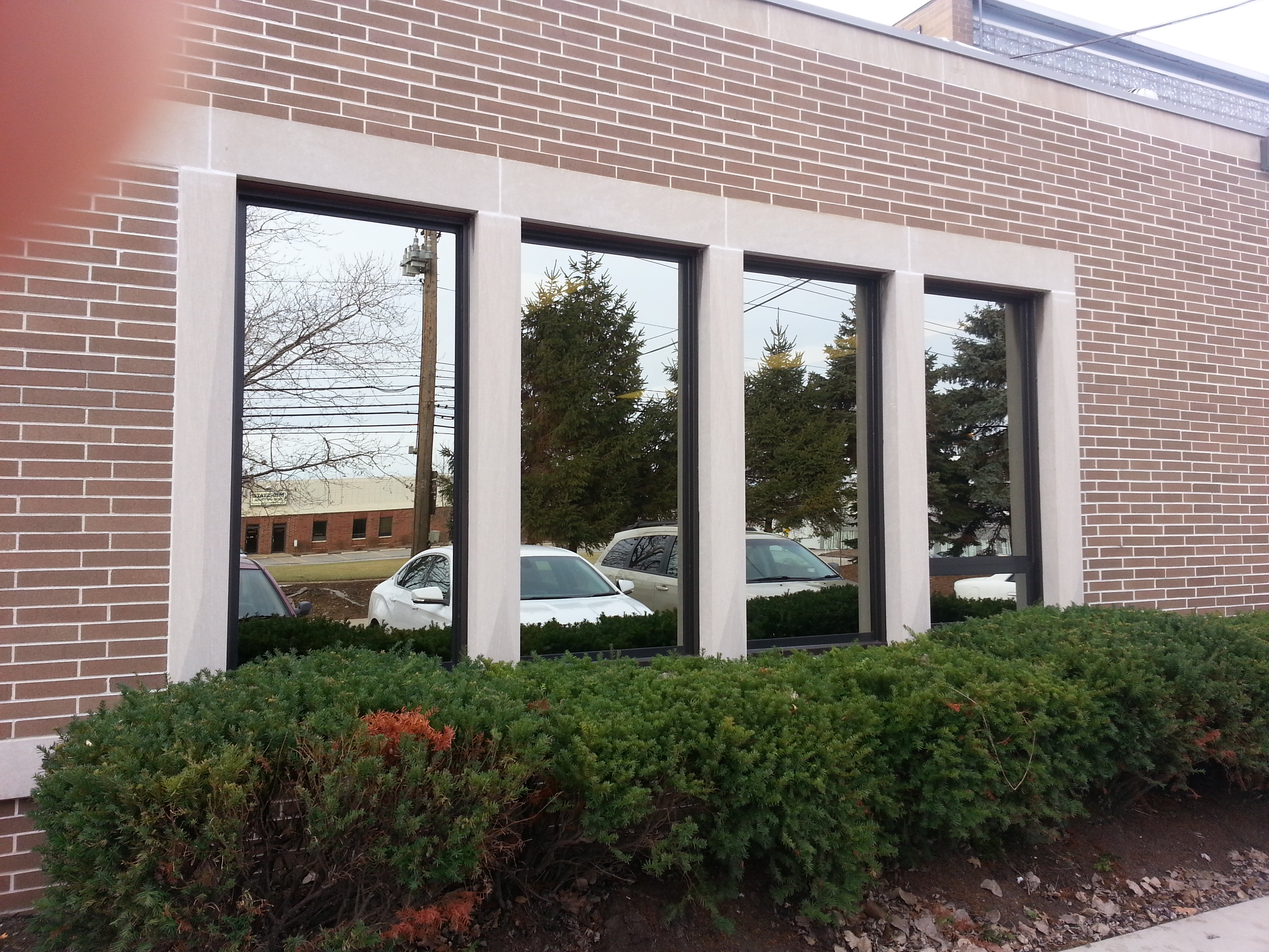 Commercial painted windows, picture and awning, bronze tint, Bedford Ohio